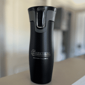 front of a travel tumbler mug for sale